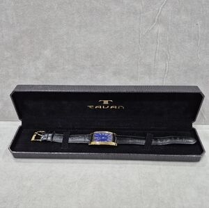 Tavan Swiss Women's watch gold tone blue face black leather band water resistant